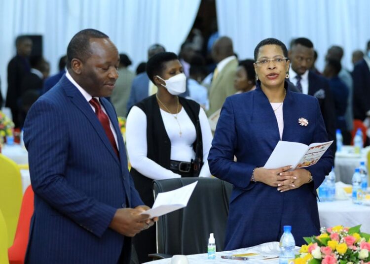 The Leader of Opposition in Parliament Mathias Mpuuga (L) and Speaker Anita Among during the joint ecumenical thanksgiving service at Parliament on February 28, 2023. PHOTO/ DAVID LUBOWA