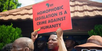 Ugandan Activists Demand International Sanctions Following Controversial Passage of Anti-Gay Law